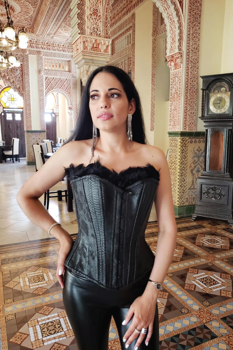 Bring-Champagne-Corsets-Wherever-You-Go-Woman-in-Black-Snakeskin-Corset-Cuba-Vacation